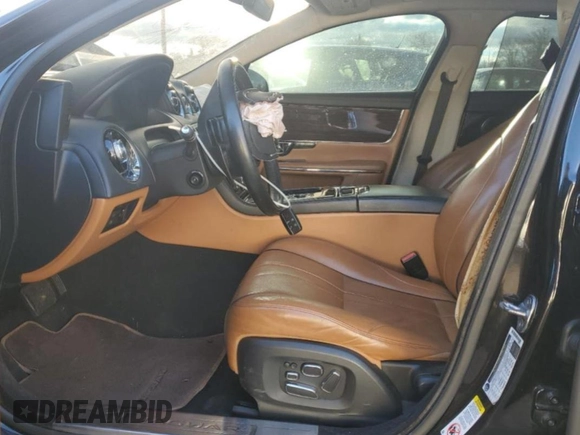 2015 Jaguar XJ Portfolio with VIN SAJWJ2GD2F8V76289, listed as a Copart auction lot 48222815 with 95,420 mi miles and Salvage title. Bid and sale history available at DreamBid. Image 7.