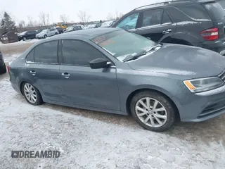 2015 Volkswagen Jetta Sport with VIN 3VWD17AJ6FM319596, listed as a IAAI auction lot 41370591 with 92,818 mi miles and . Bid and sale history available at DreamBid. Image 13.
