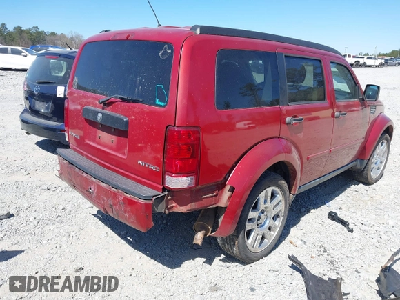 2010 Dodge Nitro SE with VIN 1D4PT2GK7AW142856, listed as a IAAI auction lot 41855687 with 197,248 mi miles. Bid and sale history available at carsss.com. Image 4.