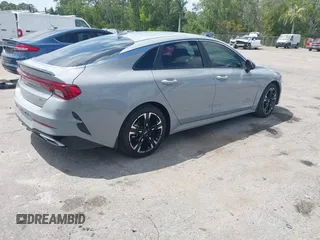 2023 Kia K5 GT-Line z VIN 5XXG64J25PG179696, wystawiony jako IAAI lot #42114587 z przebiegiem 49 192 mil mil oraz . Historia ofert i sprzedaży dostępna na DreamBid. Obrazek 4.