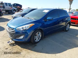2014 Hyundai Elantra GT with VIN KMHD35LHXEU230812, listed as a IAAI auction lot 41855509 with 122,729 mi miles. Bid and sale history available at carsss.com. Image 17.