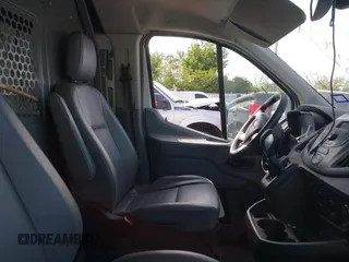 2016 Ford Transit Cargo with VIN 1FTYE1ZM0GKB06687, listed as a IAAI auction lot 42232871 with 330,423 mi miles and . Bid and sale history available at DreamBid. Image 5.