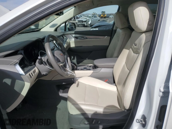 2021 Cadillac XT5 FWD Premium Luxury with VIN 1GYKNCRS0MZ110560, listed as a Copart auction lot 52779575 with 44,559 mi miles and Salvage title. Bid and sale history available at DreamBid. Image 7.