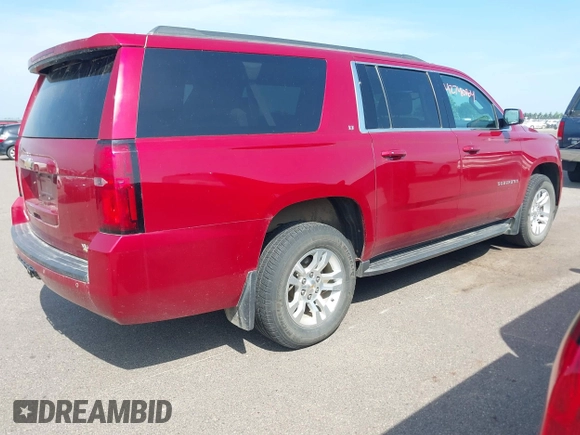 2015 Chevrolet Suburban LT with VIN 1GNSKJKC5FR726299, listed as a IAAI auction lot 42740904 with 96,700 mi miles and . Bid and sale history available at DreamBid. Image 4.