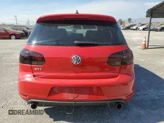 2012 Volkswagen GTI w/Conv & Sunroof z VIN WVWEV7AJ8CW148101, wystawiony jako Copart lot #74610214 z przebiegiem 154 813 mil mil oraz Szkoda całkowita • Salvage title. Historia ofert i sprzedaży dostępna na DreamBid. Obrazek 6.