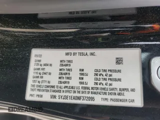 2022 Tesla Model 3 with VIN 5YJ3E1EA0NF372095, listed as a Copart auction lot 54958215 with 148,441 mi miles and Clean Title. Bid and sale history available at DreamBid. Image 12.