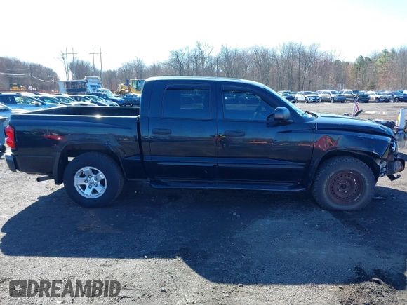 2005 Dodge Dakota SLT z VIN 1D7HW48N25S178373, wystawiony jako IAAI lot #41815561 z przebiegiem 148 112 mil mil oraz . Historia ofert i sprzedaży dostępna na DreamBid. Obrazek 13.