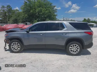 2019 Chevrolet Traverse LT Cloth with VIN 1GNERGKW0KJ123288, listed as a IAAI auction lot 42345412 with 78,696 mi miles and . Bid and sale history available at DreamBid. Image 14.