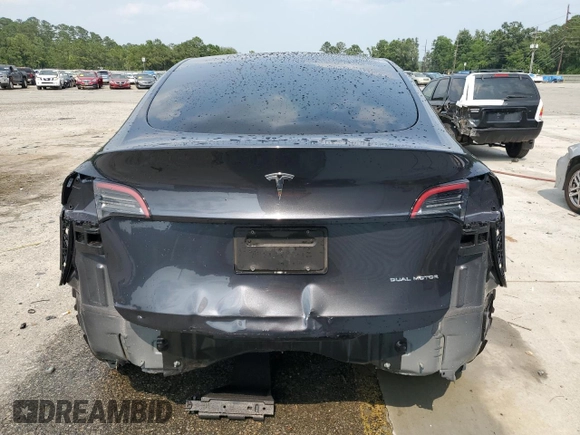 2024 Tesla Model Y Long Range with VIN 7SAYGDEE0RA255613, listed as a Copart auction lot 58993085 with 39,336 mi miles and Salvage title. Bid and sale history available at DreamBid. Image 6.