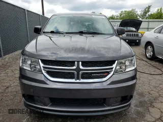 2014 Dodge Journey American Value with VIN 3C4PDCAB1ET135504, listed as a Copart auction lot 58803645 with 164,501 mi miles and Clean title. Bid and sale history available at DreamBid. Image 5.