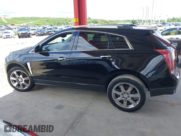 2012 Cadillac SRX Premium Collection z VIN 3GYFNCE36CS615725, wystawiony jako IAAI lot #42738584 z przebiegiem 156 625 mil mil oraz . Historia ofert i sprzedaży dostępna na DreamBid. Obrazek 14.