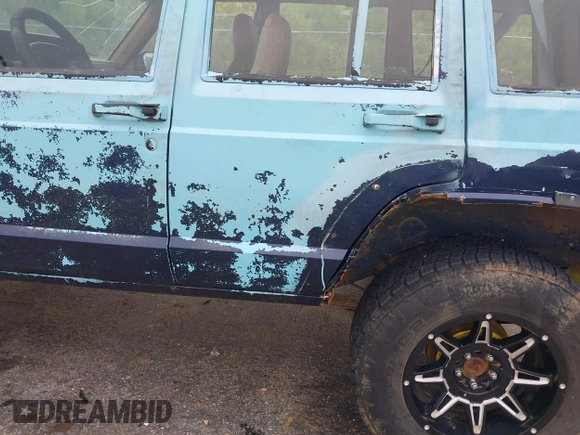 1997 Jeep Cherokee SE z VIN 1J4FJ28S3VL573144, wystawiony jako IAAI lot #41965201 z przebiegiem 298 276 mil mil oraz . Historia ofert i sprzedaży dostępna na DreamBid. Obrazek 19.