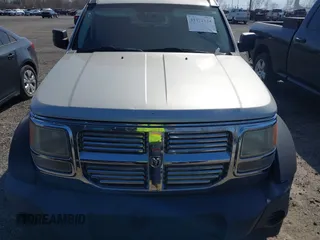 2008 Dodge Nitro SXT with VIN 1D8GU28K68W271921, listed as a IAAI auction lot 41772124 with 233,078 mi miles. Bid and sale history available at carsss.com. Image 6.