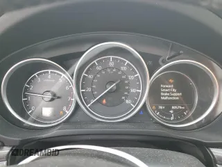 2018 Mazda CX-5 Grand Touring z VIN JM3KFBDM6J0447165, wystawiony jako Copart lot #56133015 z przebiegiem 80 579 mil mil oraz Szkoda całkowita • Salvage title. Historia ofert i sprzedaży dostępna na DreamBid. Obrazek 9.