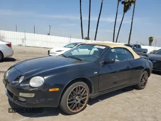 1997 Toyota Celica GT with VIN JT5FG02TXV0044202, listed as a Copart auction lot 52166575 with 167,292 mi miles and Salvage Title. Bid and sale history available at carsss.com. Image 1.