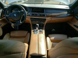2014 BMW 7 Series 740Li xDrive with VIN WBAYF4C50ED281830, listed as a Copart auction lot 48557035 with 129,497 mi miles and Salvage Title. Bid and sale history available at carsss.com. Image 8.