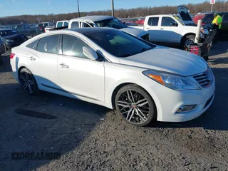 2012 Hyundai Azera with VIN KMHFH4JG0CA162291, listed as a IAAI auction lot 41012822 with 205,531 mi miles. Bid and sale history available at carsss.com. Image 1.