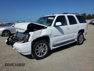 2003 GMC Yukon Denali z VIN 1GKEK63UX3J233548, wystawiony jako Copart lot #54357065 z przebiegiem Nie podano mil oraz Szkody całkowita. Historia ofert i sprzedaży dostępna na DreamBid. Obrazek 1.