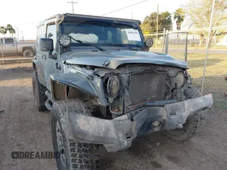 2014 Jeep Wrangler Sport with VIN 1C4AJWAG0EL326774, listed as a IAAI auction lot 41691784 with 98,696 mi miles and . Bid and sale history available at DreamBid. Image 1.