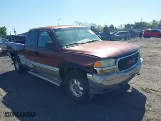 1999 GMC New Sierra 1500 SLE with VIN 2GTEK19T3X1525779, listed as a IAAI auction lot 41986559 with NaN miles. Bid and sale history available at carsss.com. Image 1.
