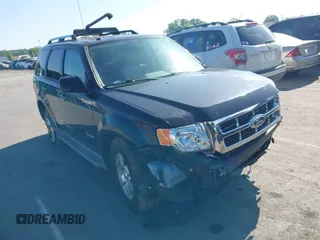 2011 Ford Escape Hybrid with VIN 1FMCU5K38BKA47494, listed as a IAAI auction lot 42158820 with 122,393 mi miles and . Bid and sale history available at DreamBid. Image 1.