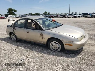 1998 Saturn SL z VIN 1G8ZK5271WZ265579, wystawiony jako Copart lot #68153934 z przebiegiem Nie podano mil oraz Szkoda całkowita • Salvage title. Historia ofert i sprzedaży dostępna na DreamBid. Obrazek 4.