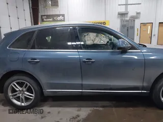 2016 Audi Q5 Premium Plus with VIN WA1L2AFP7GA136934, listed as a IAAI auction lot 41833639 with 87,278 mi miles and . Bid and sale history available at DreamBid. Image 14.