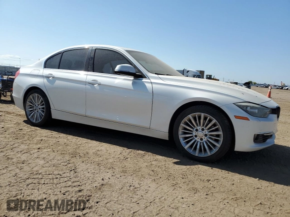2013 BMW 3 Series 328i xDrive with VIN WBA3B3C51DF532714, listed as a Copart auction lot 57854735 with 140,650 mi miles and Salvage title. Bid and sale history available at DreamBid. Image 4.