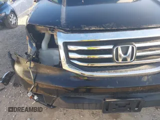 2013 Honda Pilot Touring with VIN 5FNYF4H96DB006582, listed as a IAAI auction lot 41722386 with 220,354 mi miles and . Bid and sale history available at carsss.com. Image 18.