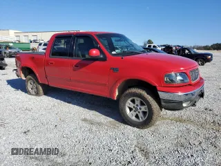2002 Ford F-150 XLT with VIN 1FTRW08L92KD88745, listed as a Copart auction lot 41397555 with 211,116 mi miles and Salvage Title. Bid and sale history available at carsss.com. Image 4.