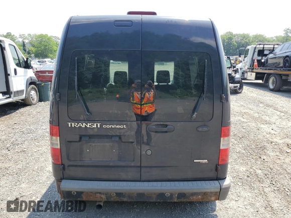 2010 Ford Transit Connect XLT with VIN NM0KS9BN2AT027939, listed as a Copart auction lot 62100305 with 294,080 mi miles and Salvage title. Bid and sale history available at DreamBid. Image 6.