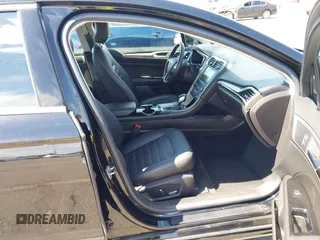2016 Ford Fusion SE Hybrid with VIN 3FA6P0LU9GR405102, listed as a IAAI auction lot 42358807 with 91,130 mi miles and . Bid and sale history available at DreamBid. Image 5.