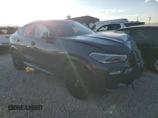 2021 BMW X6 M50i with VIN 5UXCY8C02M9G71110, listed as a Copart auction lot 76124114 with 0 mi miles and Salvage Title. Bid and sale history available at carsss.com. Image 4.