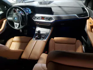 2023 BMW X5 xDrive45e with VIN 5UXTA6C03P9R22002, listed as a Copart auction lot 56293765 with 35,204 mi miles and Salvage title. Bid and sale history available at DreamBid. Image 8.