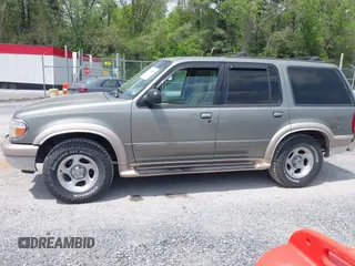 2000 Ford Explorer Eddie Bauer z VIN 1FMDU74E2YUA00568, wystawiony jako IAAI lot #42176409 z przebiegiem 150 479 mil mil oraz . Historia ofert i sprzedaży dostępna na DreamBid. Obrazek 14.