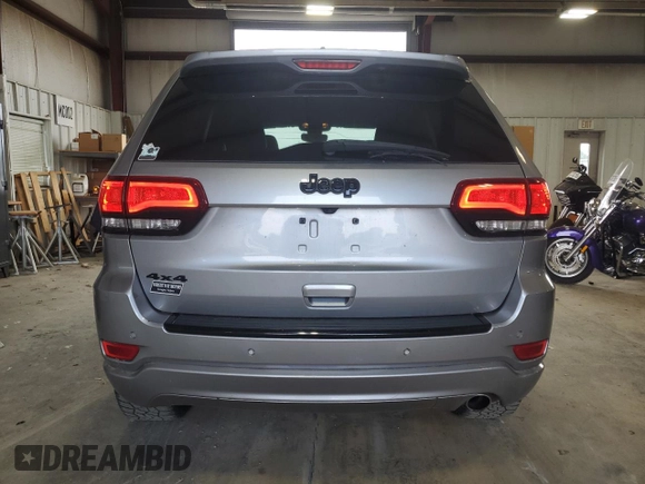 2017 Jeep Grand Cherokee Altitude with VIN 1C4RJFAG9HC772705, listed as a Copart auction lot 61562925 with 184,004 mi miles and Salvage title. Bid and sale history available at DreamBid. Image 6.