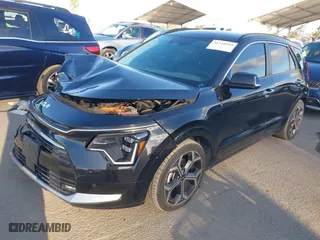2023 Kia Niro SX Touring with VIN KNDCT3LE6P5038102, listed as a IAAI auction lot 41710555 with 57,669 mi miles. Bid and sale history available at carsss.com. Image 17.