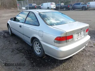 1999 Honda Civic HX with VIN 1HGEJ7122XL020224, listed as a IAAI auction lot 41723460 with 202,759 mi miles. Bid and sale history available at carsss.com. Image 3.