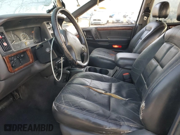 1998 Jeep Grand Cherokee Limited с VIN 1J4GZ78Y0WC260231, выставлен на аукционе Copart как лот 85149724 с пробегом 203 258 миль миль и Списание • Salvage title. История ставок и продаж доступна на DreamBid. Изображение 7.