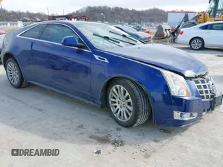 2014 Cadillac CTS Performance z VIN 1G6DG1E37E0121415, wystawiony jako IAAI lot #41673658 z przebiegiem 113 715 mil mil oraz . Historia ofert i sprzedaży dostępna na DreamBid. Obrazek 1.