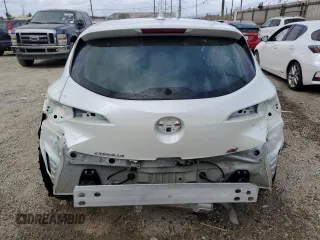 2020 Toyota Corolla Hatchback SE with VIN JTND4RBEXL3090940, listed as a Copart auction lot 77747284 with 58,201 mi miles and Salvage Title. Bid and sale history available at carsss.com. Image 6.