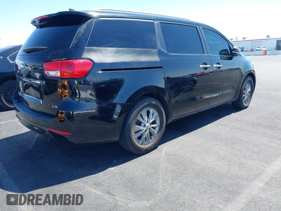 2017 Kia Sedona LX with VIN KNDMB5C17H6319935, listed as a IAAI auction lot 42025352 with 74,561 mi miles. Bid and sale history available at carsss.com. Image 4.