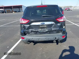2013 Ford Escape SEL with VIN 1FMCU9H95DUA46183, listed as a IAAI auction lot 41903684 with 243,026 mi miles. Bid and sale history available at carsss.com. Image 6.