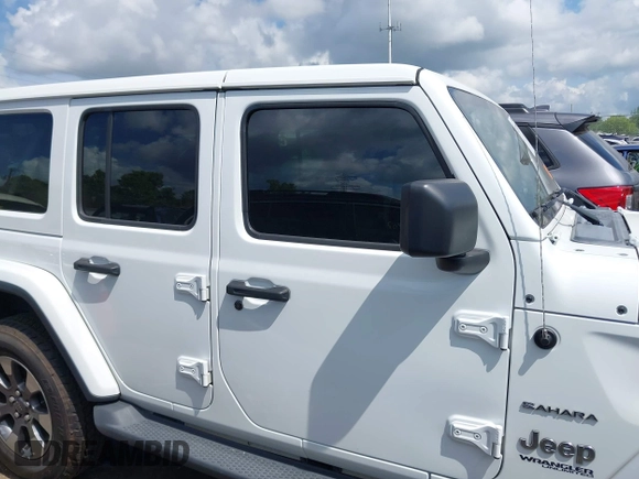 2018 Jeep Wrangler Unlimited Sahara with VIN 1C4HJXEG1JW205789, listed as a IAAI auction lot 42435877 with 57,587 mi miles and . Bid and sale history available at DreamBid. Image 14.