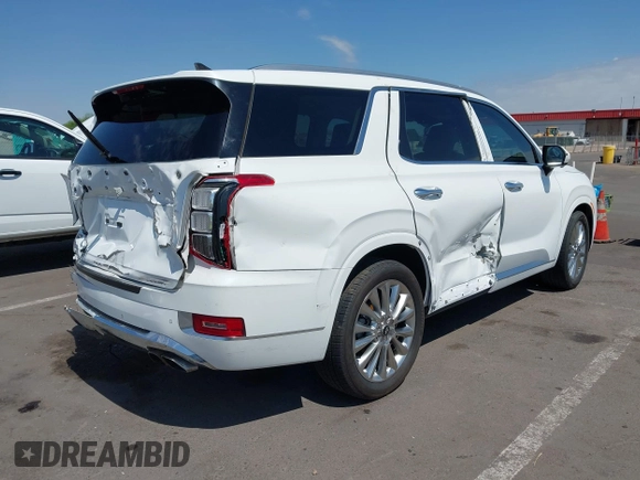 2020 Hyundai Palisade Limited with VIN KM8R5DHEXLU097166, listed as a IAAI auction lot 41480825 with 79,500 mi miles and . Bid and sale history available at DreamBid. Image 4.