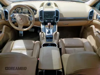 2013 Porsche Cayenne S Hybrid с VIN WP1AE2A20DLA14095, выставлен на аукционе Copart как лот 64215625 с пробегом 148 286 миль миль и Списание • Salvage title. История ставок и продаж доступна на DreamBid. Изображение 8.