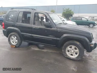 2004 Jeep Liberty Limited with VIN 1J4GL58K94W318379, listed as a IAAI auction lot 41802645 with 275,834 mi miles. Bid and sale history available at carsss.com. Image 1.