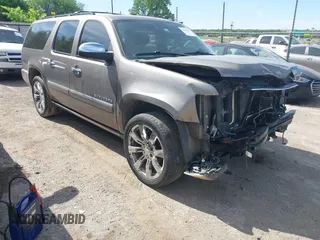 2011 Chevrolet Suburban LTZ z VIN 1GNSCKE04BR312543, wystawiony jako IAAI lot #42267293 z przebiegiem 253 305 mil mil oraz . Historia ofert i sprzedaży dostępna na DreamBid. Obrazek 1.