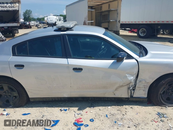 2021 Dodge Charger Police z VIN 2C3CDXAT3MH578330, wystawiony jako IAAI lot #42604008 z przebiegiem 92 856 mil mil oraz . Historia ofert i sprzedaży dostępna na DreamBid. Obrazek 13.