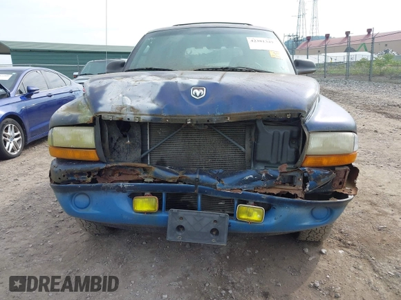 1999 Dodge Durango z VIN 1B4HS28Y0XF665181, wystawiony jako IAAI lot #42381349 z przebiegiem Nie podano mil oraz . Historia ofert i sprzedaży dostępna na DreamBid. Obrazek 6.